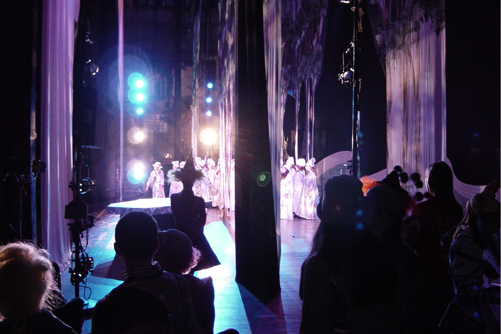Live opera performance viewed from the wings
